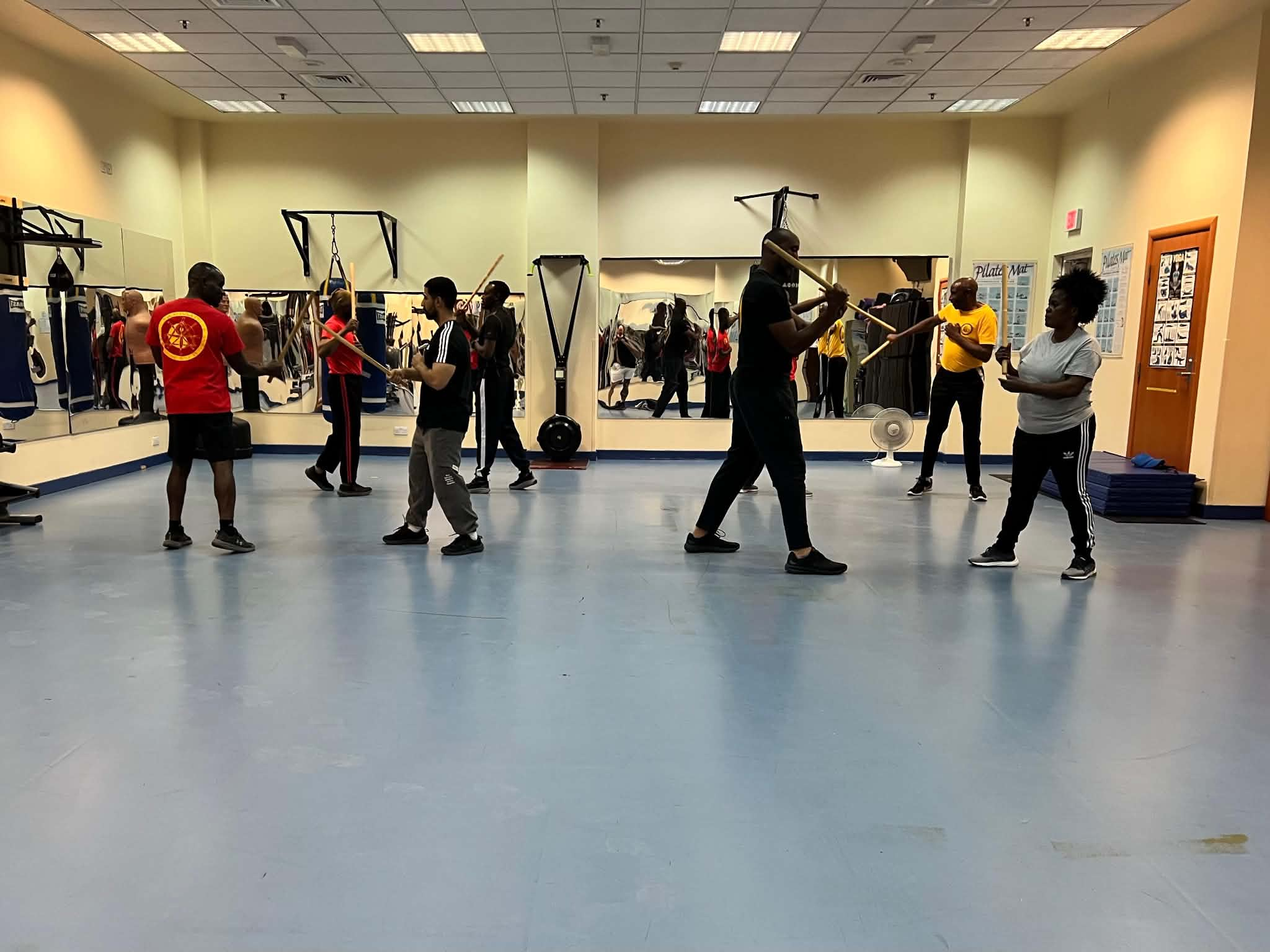 Stick fighting drill training session